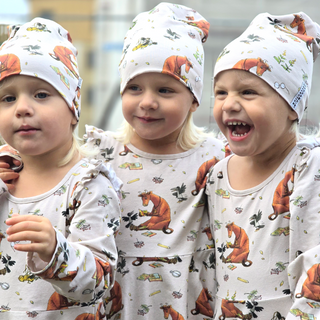 Geggamoja Mössa Mamma Mu och Kråkan Beige